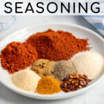 Pinterest Pin with text 'The Best Homemade Fajita Seasoning', image of a plate of spices.
