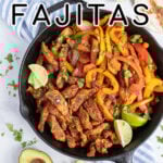 Pinterest Pin with text 'Chicken Fajitas', image of a cast iron filled with chicken and brightly colored bell peppers.