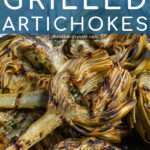 Pinterest Pin with text 'How to Make Grilled Artichokes', image of a close up of half an artichoke with perfect charred grill marks.