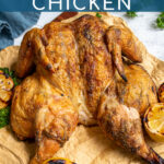 Pinterest Pin with text 'Grilled Spatchcocked Chicken', image of golden brown grilled chicken on a cutting board.