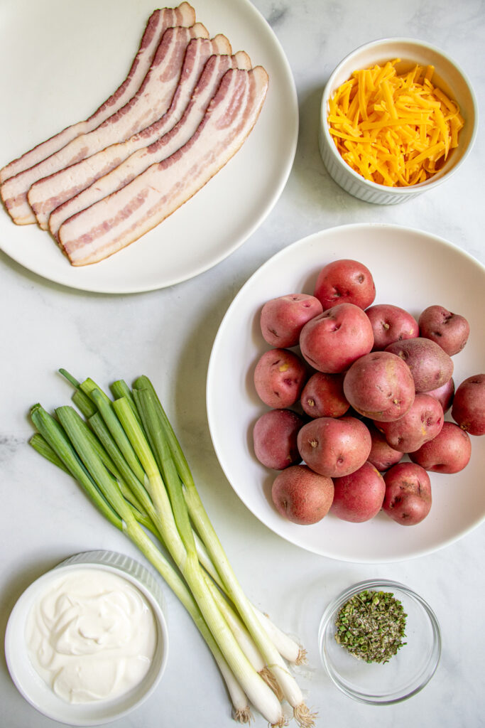 Ingredients needed to make healthy bacon ranch potato salad.