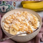 Pinterest Pin with text overlay ' Peanut Butter & Banana Cottage Cheese Breakfast Bowl', image of bowl filled with cottage cheese, banana slices, and drizzled peanut butter.