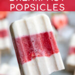 Pinterest Pin with text 'Healthy Breakfast Popsicles', image of close up of a hand holding a red and white layered popsicle.