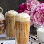 Pinterest Pin with text overlay 'Salted Maple Cold Brew Coffee', image of a glass of cold brew with a foam top.