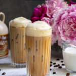Pinterest Pin with text overlay 'Salted Maple Cold Brew', image of a glass of cold brew with a foam top.