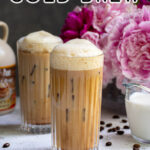 Pinterest Pin with text overlay 'Salted Maple Cold Brew', image of a glass of cold brew with a foam top.