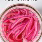 Pinterest Pin with text 'Quick Pickled Red Onions' with image of jar of red quick pickled onions.