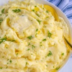 Pinterest Pin with text 'Mashed Potatoes Stovetop or Instant Pot Instructions', image of a large bowl of classic mashed potatoes with melted butter.