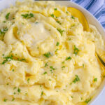 Pinterest Pin with text 'Mashed Potatoes Stovetop or Instant Pot Instructions', image of a large bowl of classic mashed potatoes with melted butter.