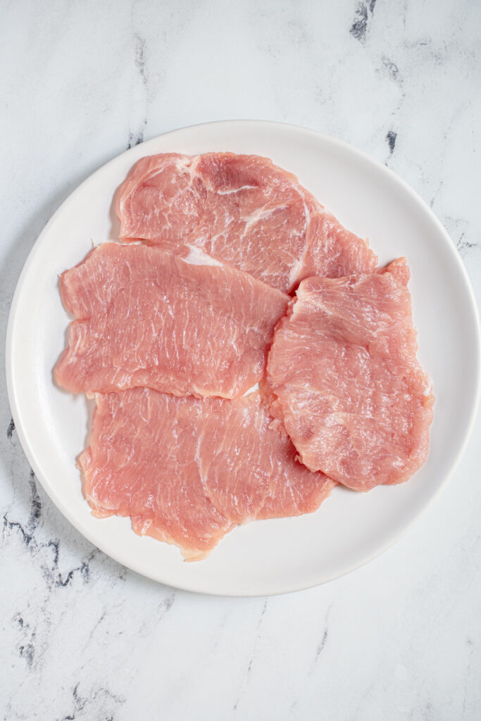 4 pork cutlets with fat removed and pounded down to about 1/4 inch thickness.