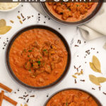 Pinterest Pin with text 'Leftover Lamb Curry', image of three black bowls filled with curry garnished with parsley.