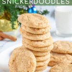 Pinterest Pin with text overlay 'Eggnog Snickerdoodles', image of a white plate full of snickerdoodles with a sugary cinnamon nutmeg outside.