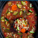 Pinterest Pin with text 'Crockpot Minestrone', image of a bowl of minestrone soup filled with vegetables, beans, and pasta.