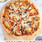 Pinterest pin with text 'Homemade Veggie Pizza', imagine of veggie pizza on a wood pizza peel.