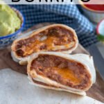 Pinterest Pin with text 'Refried Bean Burrito', with image of two halves of a burrito cut open to reveal the inside on a cutting board.