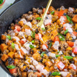 Pinterest pin with text overlay 'Turkey & Sweet Potato Skillet', image of turkey, sweet potatoes, and black beans in a cast iron skillet.
