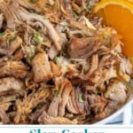 Pinterest Pin with text overlay 'Slow Cooker Cuban Mojo Pork', image of bowl of mojo pulled pork.