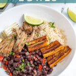 Pinterest Pin with text overlay 'Cuban Bowls', image of a bowl filled with rice, black beans, pork, and fried plantains.