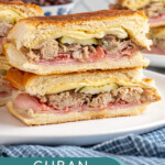 Pinterest Pin with text overlay 'Cuban sandwiches', image of a sandwich cut in half and stacked on top of each other showing off the insides.