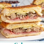 Pinterest Pin with text overlay 'Cuban sandwiches', image of a sandwich cut in half and stacked on top of each other showing off the insides.