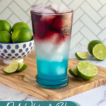 Pinterest pin with text overlay 'red, white, and blue devils' margarita', image of a glass with layered red, white, and blue margarita.