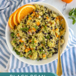 Pinterest Pin with text overlay 'Black bean Quinoa Salad with Orange Cilantro Dressing', image of a white bowl filled with black bean quinoa salad garnish with cilantro.