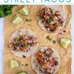 Pinterest Pin with text overlay 'Grilled Chicken Street Tacos', image of grilled chicken taco with toppings.