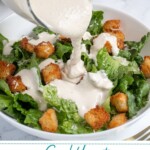 Pinterest pin with text overlay 'Greek Yogurt Caesar Dressing', image of Greek Yogurt Caesar Dressing in a white bowl with a spoon.