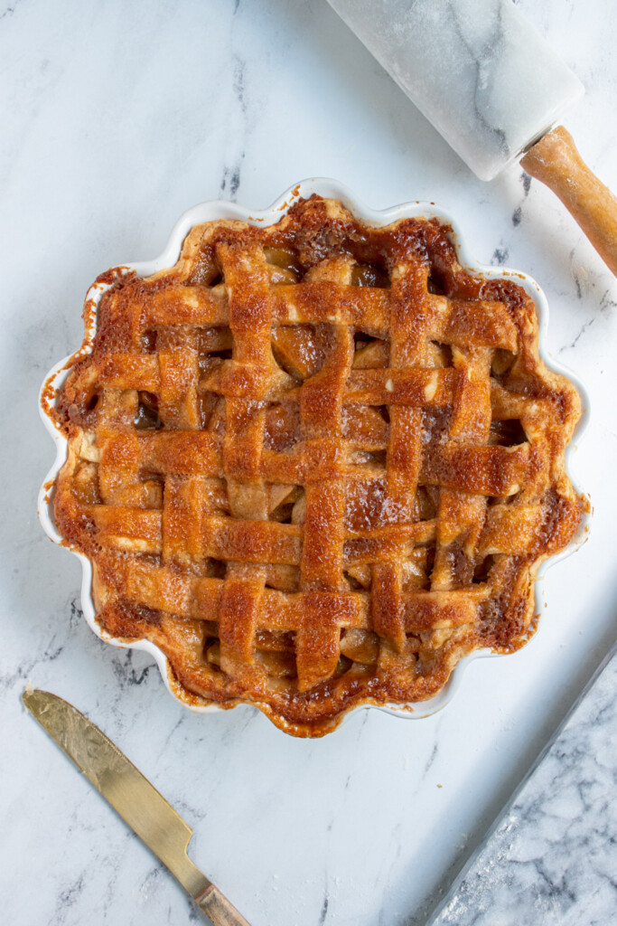 A freshly baked homemade apple pie straight out of the oven.