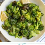 Pinterest pin with text overlay "Air Fryer Broccoli", image of a white bowl with cooked broccoli.