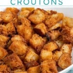 Pinterest pin with text overlay 'Air Fryer Croutons', image of golden brown crunchy croutons in a bowl.