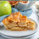Pinterest Pin with text overlay 'Homemade Apple Pie', image of a slice of apple pie on a white plate.