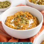 Pinterest Pin with text 'Instant Pot Pumpkin Steel Cut Oats', image of a white bowl with pumpkin oatmeal and garnished with cream and pumpkin seeds.