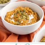 Pinterest Pin with text 'Instant Pot Pumpkin Steel Cut Oats', image of a white bowl with pumpkin oatmeal and garnished with cream and pumpkin seeds.