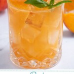 Pinterest pin with text over lay 'Peach Bourbon Smash', image of a glass filled with a peach bourbon cocktail garnished with a peach slice and fresh basil leaves.
