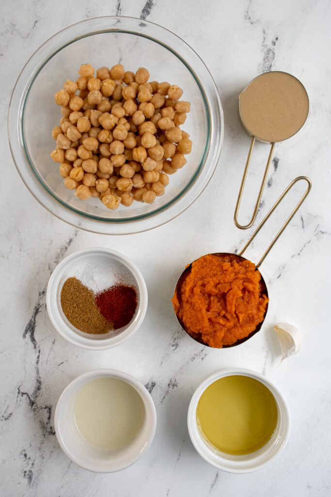 Ingredients needed to make the recipe for pumpkin hummus.