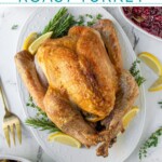Pinterest pin with text overlay 'Easy No-Fuss Roast Turkey', image of a thanksgiving turkey on a white platter.