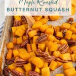 Pinterest pin with text overlay 'Maple Roasted Butternut Squash', image os a sheet pan with cooked squash and pecans.