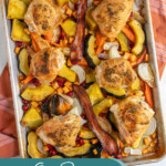 Pinterest pin with text overlay 'One Pan Autumn Chicken Dinner', image of a sheet pan with veggies and chicken thighs.