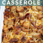 Pinterest Pin with text overlay "Hash Brown & Bacon Breakfast Casserole", image of a white casserole dish with a baked breakfast casserole.