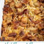 Pinterest Pin with text overlay "Hash Brown & Bacon Breakfast Casserole", image of a white casserole dish with a baked breakfast casserole.