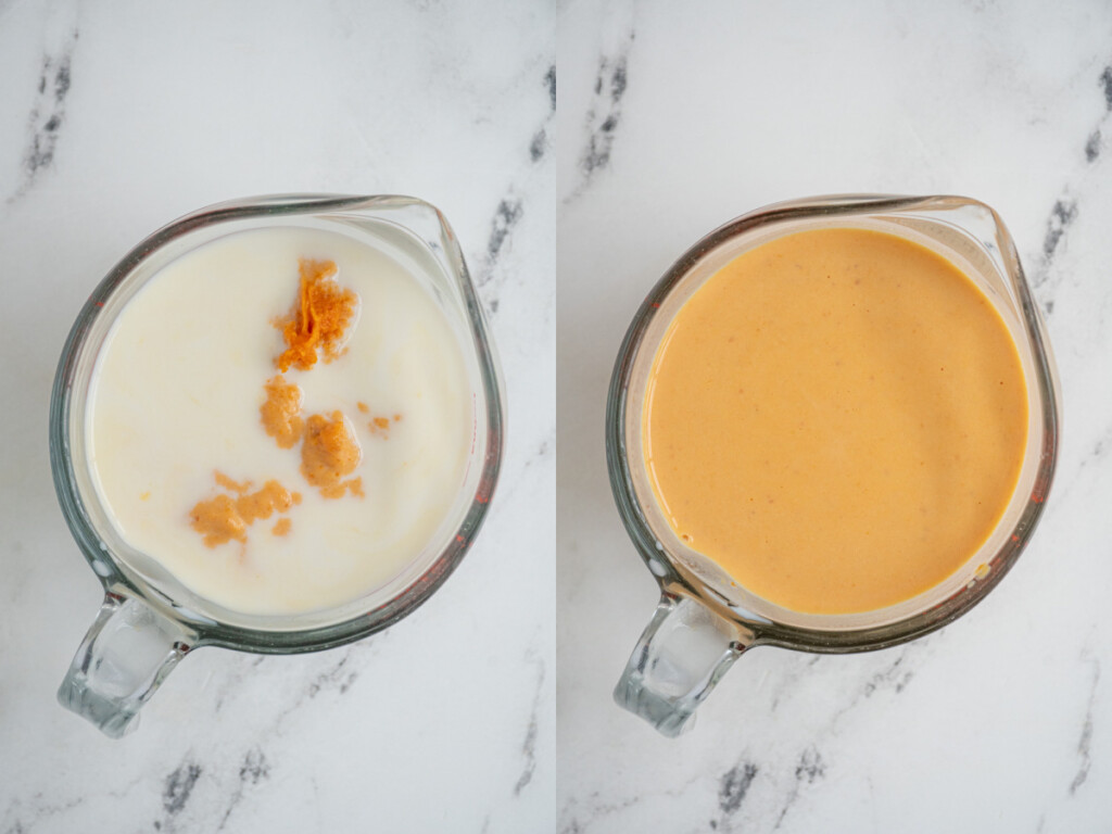 Overhead view of a glass measuring cup with pumpkin and milk whisked together.