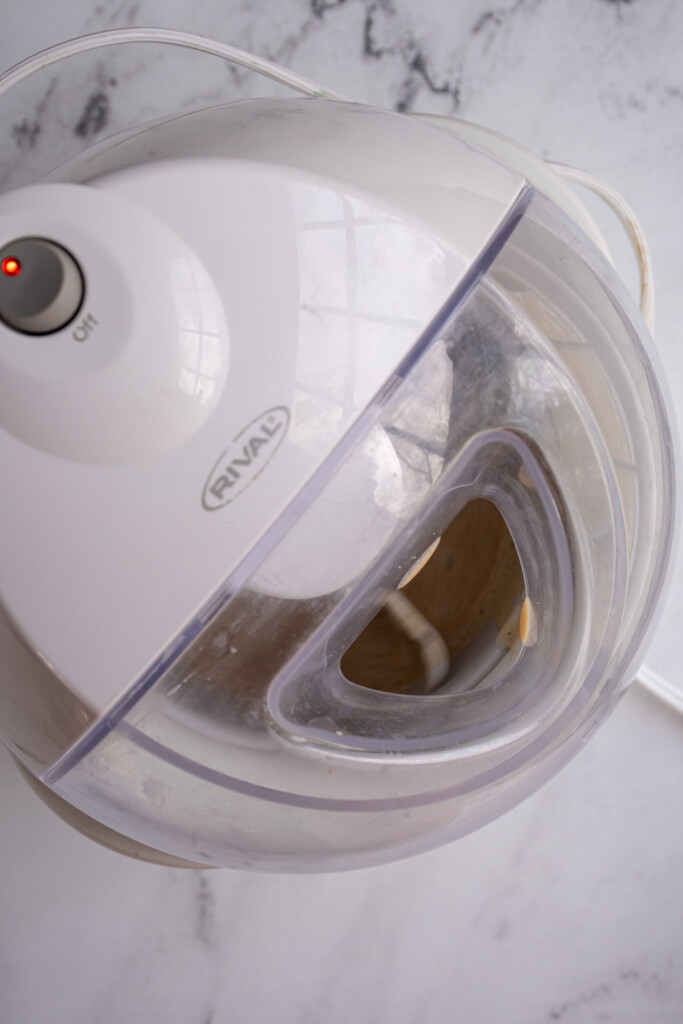 The top of a white ice cream maker.
