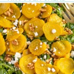 Pinterest pin with text "Golden Beet & Arugula Salad", image of a platter of arugula with roasted beets, walnuts, and feta cheese.