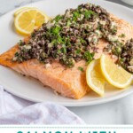 Pinterest pin with text overlay "Salmon with Olive Tapenade" with image of a plate of salmon topped with olive tapenade.