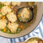 Pinterest pin with text overlay 'Cozy Veggie Dumpling Soup', image of a large pot filled with veggie dumpling soup.