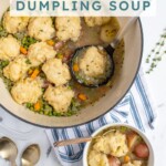 Pinterest pin with text overlay 'Cozy Veggie Dumpling Soup', image of a large pot filled with veggie dumpling soup.