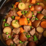 Pinterest pin with logo overlay 'the Schmidty wife', image of a crockpot filled with homemade beef stew.