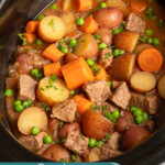 Pinterest pin with text overlay 'Crockpot Beef Stew', image of a crockpot filled with homemade beef stew.