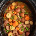 Pinterest pin with text overlay 'Crockpot Beef Stew', image of a crockpot filled with homemade beef stew.